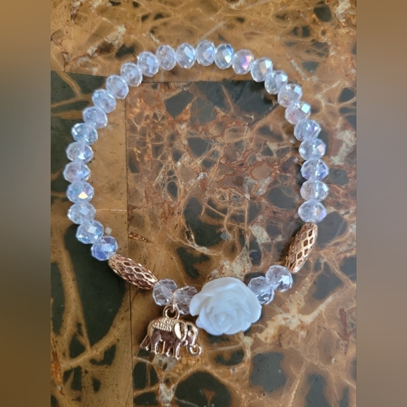 unbranded Jewelry - Elegant White Beaded Bracelet with Rose and Elephant Ch